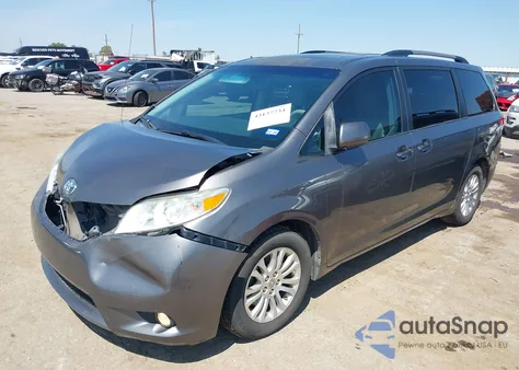 2011 Toyota Sienna Xle V6 z USA, uszkodzony, nr VIN 5TDYK3DCXBS143010